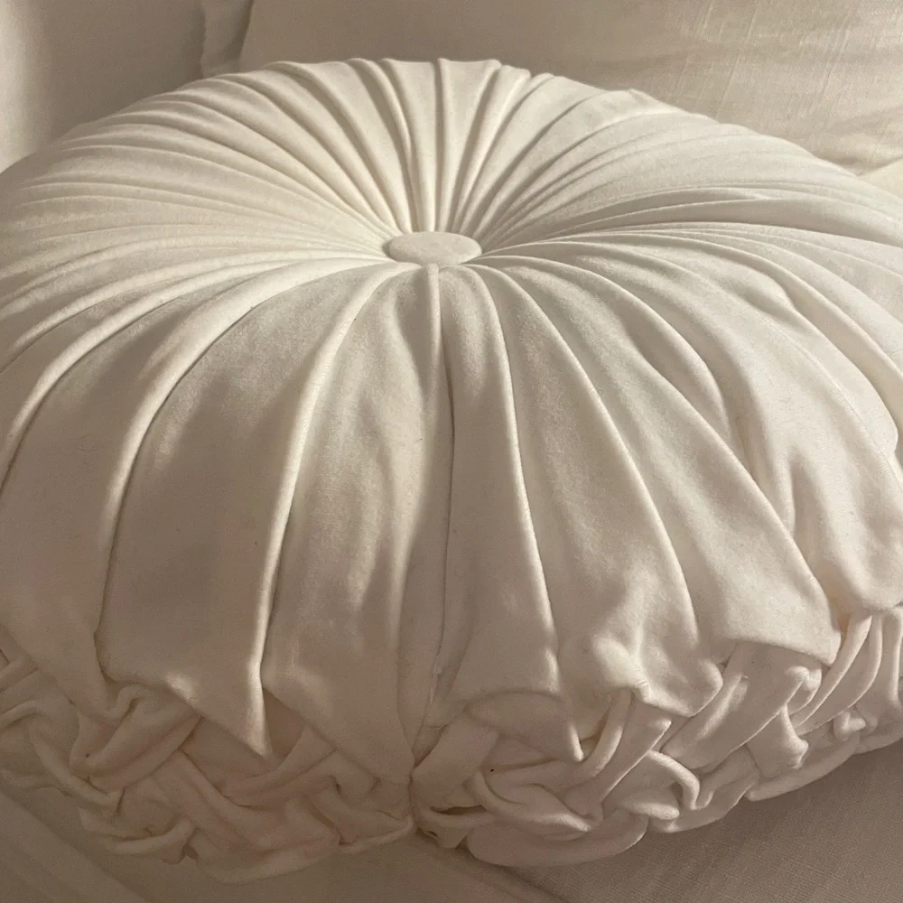 Round white velvet tufted pillow